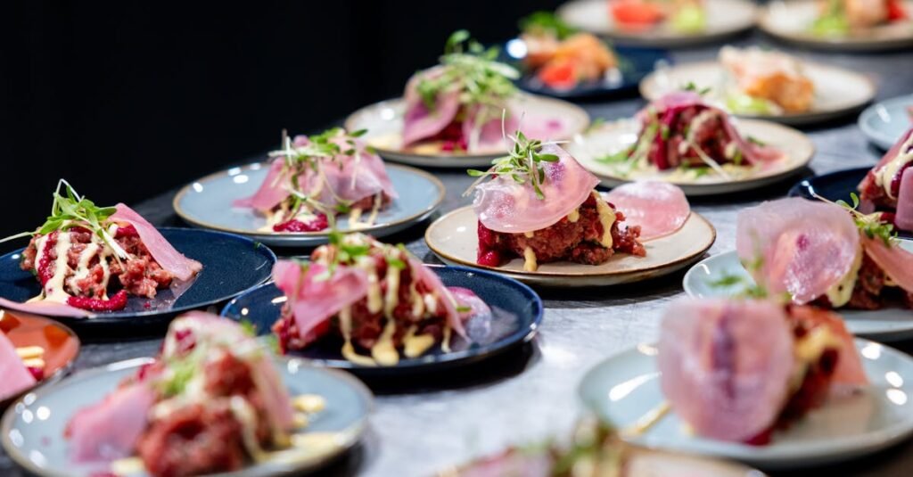 A variety of gourmet tapas presented beautifully in an upscale restaurant, highlighting culinary artistry.